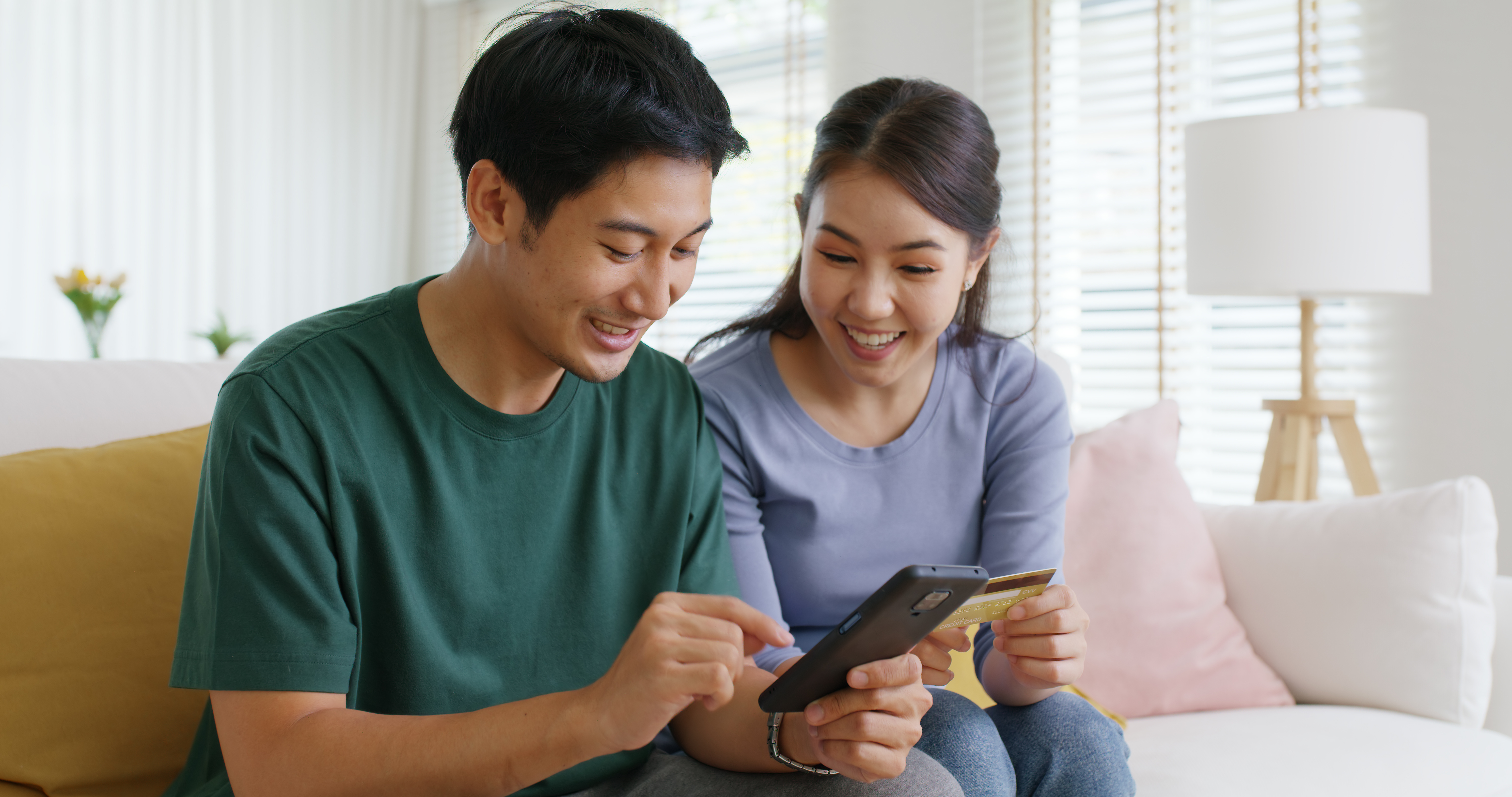 Couple looking at the same phone